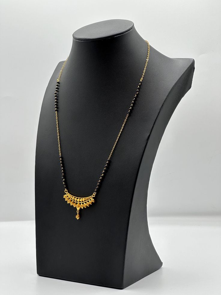 Experience timeless elegance with our South Asian Black Bead Mangalsutra. This exquisite piece of jewelry beautifully blends traditional craftsmanship with contemporary design. The black beads symbolize protection and prosperity, making it a perfect choice for brides and married women. The delicate gold-plated chain adds a touch of sophistication to this classic accessory. Handcrafted with precision and adorned with intricate details, this mangalsutra captures the essence of South Asian culture Mangalsutra Traditional, Black Beads Mangalsutra, Gold Mangalsutra, Android Wallpaper Flowers, Asian Culture, Black Bead Necklace, Married Woman, Stone Gold, South Asian