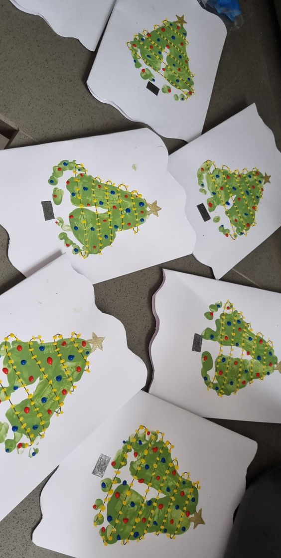 several pieces of paper with christmas trees on them