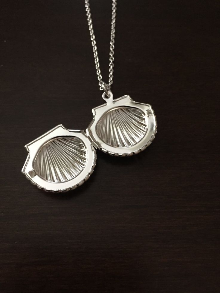 seashell locket, shell locket, shell necklace, seashell necklace, shell jewelry, seashell jewelry, silver shell necklace, shell, seashell, silver shell, necklace ★ Total Chain Length: 18 inches ★ Pendant Size: 2 cm This necklace is also available in gold: https://www.etsy.com/listing/679948995/seashell-seashell-necklace-seashell?ref=shop_home_active_1&frs=1 ★ Want to see more? Please click on: kmsupplies.etsy.com 11 Luxury Silver Shell Necklace, Seashell Locket, Shell Locket, Necklace Seashell, Necklace Shell, Locket Ring, Seashell Jewelry, Seashell Necklace, Silver Lockets