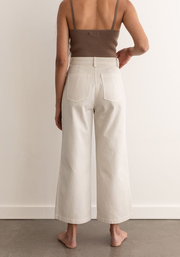 This sale item is final sale. Our favorite foundational trousers are back in a new 100% cotton twill. Designed with a flattering high rise that is fitted through the hips and opens to a comfortable wide leg hem. The new easy, everyday, go with anything trouser. Cut from a new OEKO Tex Certified 100% cotton twill. Garment dyed to reduce shrink and add some softness with a slightly washed finish. Machine wash cold, line dry.Made in India by our Fair Trade Certified partners. We list actual garment Fall Cotton Wide Leg Pants With Straight Hem, Cotton Wide Leg Pants With Straight Hem For Fall, Everyday Cotton Wide Leg Pants With Straight Hem, Fall Cotton Wide Leg Pants With Five Pockets, Everyday Cotton Wide Leg Pants With Relaxed Fit, Everyday Relaxed Fit Cotton Wide Leg Pants, Cotton Wide Leg Pants For Everyday In Spring, Everyday Cotton Wide Leg Pants For Spring, Cotton Wide Leg Pants For Everyday Spring Wear