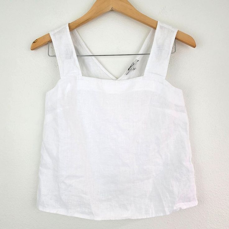 Madewell Irene 100% Linen Cross Back Sleeveless White Top Size 00 Minimalist New Style And Materials: Coming In Breezy 100 Percent Linen, This Square-Neck Tank Has A Relaxed Fit And Crisscross Back. Regular Fit. Length: Designed To Hit Between The Belly Button And High Hip. Minimalist, Boho, Contemporary, Madewell, Linen Size: 00 Please See Photos For Measurements (In Inches) Condition: New With Tags. Flaws: Brand Tag Crossed With Marker. See Pics For More Details. Non Smoking Home All Our Items White Linen Sleeveless Vest, Spring Everyday Tops With Wide Straps, Summer Tank Top With Wide Straps, Spring Tops With Wide Straps For Everyday, Wide Strap Tops For Everyday Spring Wear, Sleeveless Linen Tank Top, Solid Linen Sleeveless Tank Top, Solid Color Linen Sleeveless Tank Top, Summer Vest Tops With Wide Straps