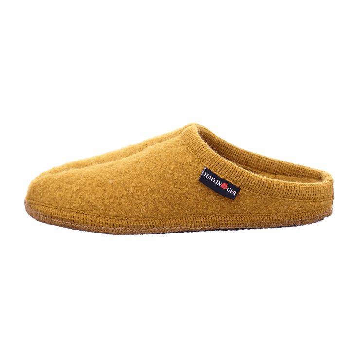 Discover unmatched comfort and style with our Haflinger Alaska Women's Slippers in vibrant yellow. Designed for the fashion-forward young adult, these slippers combine cozy warmth with durable craftsmanship. Perfect for lounging at home or quick outings, they are a must-have for those who value both style and functionality. The footbed provides excellent support for day-long comfort, making them your go-to choice for indoor footwear.Our Haflinger shoes, made from 100% natural wool and high-quality leather, offer optimal comfort throughout the year. The breathable and skin-friendly materials keep your feet warm in winter and cool in summer. Our non-slip soles ensure safety on any surface. Choose from a variety of designs to perfectly complement your style—ideal for any occasion. Haflinger Shoes, Women's Slippers, Natural Wool, High Quality Leather, Womens Slippers, Alaska, Fashion Forward, Slippers, At Home