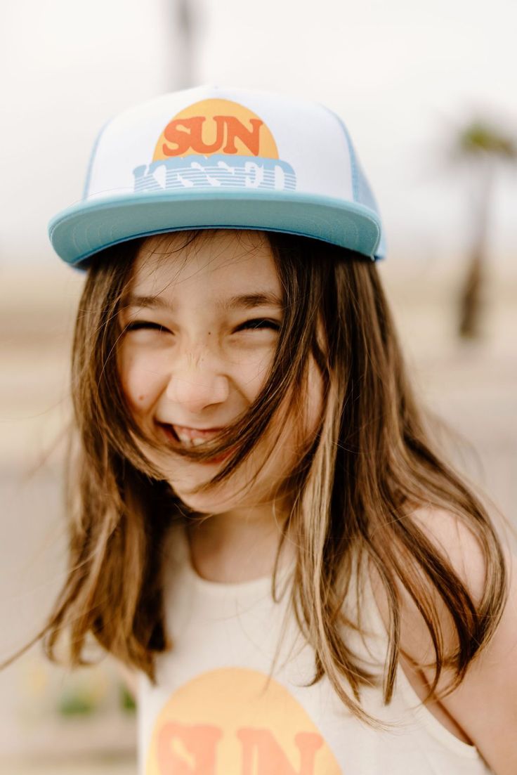 Summer is for sunkissed hair! Enjoy the ocean breeze while walking the boardwalk in this trucker hat. Made in Los Angeles Upf 50+ Summer Trucker Hat, Summer Trucker Hat With Upf 50+, Summer Trucker Hat With Upf 50+ Protection, Summer Snapback Trucker Hat With Upf 50+, Trendy Trucker Hat With Curved Bill For Beach, Trendy Curved Bill Trucker Hat For Beach, Summer Beach Sun Hat With Curved Bill, Summer Trucker Hat With Upf 50+ And Curved Brim, Spring Beach Sun Hat With Curved Bill