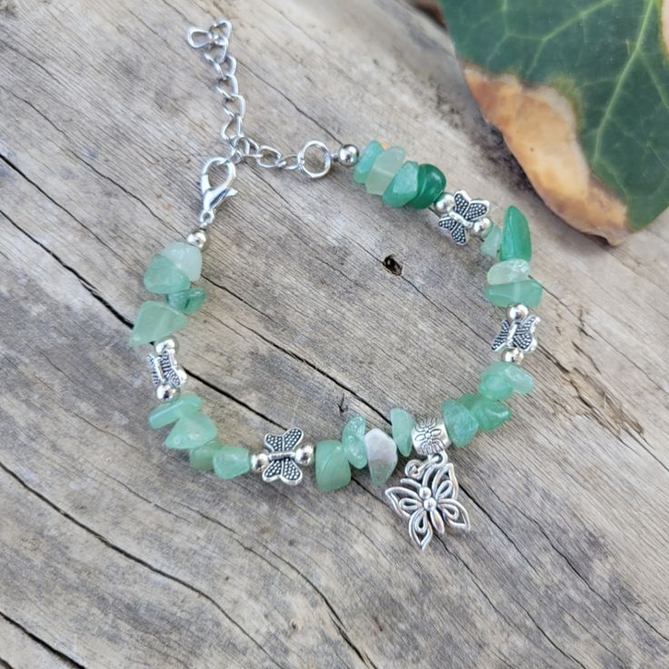 Gorgeous Green Aventurine Crystal Butterfly Charm Adjustable Bracelet. Gemstone Bracelet Has Green Aventurine Crystals With 4 Small Butterfly Charms In Between And Bigger Focal Butterfly That Measures 1/2 Inch... Bracelet Does Not Stretch But Is Adjustable Up To 8 1/2 Inches With Small W Inch Adjustable Chain At Thd End. Handmade For Women And Girls. Silver Bracelets With Amazonite And Natural Stones, Handmade Silver Amazonite Beaded Bracelets, Silver Amazonite Bracelet As Gift, Silver Amazonite Bracelet For Gift, Silver Aventurine Bracelet Jewelry, Silver Charm Bracelet With Natural Stones For Healing, Silver Aventurine Bracelet, Silver Jade Beaded Bracelets As Gift, Spiritual Silver Beaded Jade Bracelets