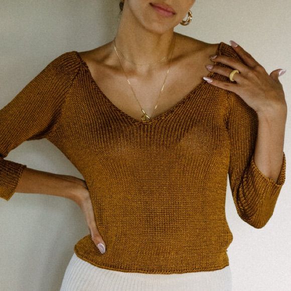 New Copper Sweater From Free People. Lightweight, Stretchy, And Breathable Construction, Perfect For A Coverup Or Evenings On The Beach. Beautiful Color And Knit With Front + Back V-Neck And 3/4 Sleeves. See Photo For Small Gap In The Back Next To Tag. 83% Viscose 17% Nylon Approx. Measurements Laying Flat Pit To Pit 12.5” Shoulder To Hem 20” Ships Quickly From A Pet- And Smoke-Free Home! Bundle With Any Item To Save 10% 20% Off Bundles Of 3+ Copper Sweater, Beach Beautiful, Free People Sweaters, Copper Metal, Gold Orange, Free People Sweater, Orange Gold, Knit Top, Beautiful Colors