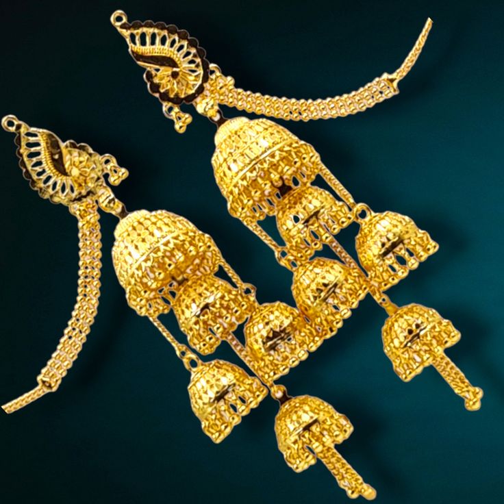 "Embrace the allure of yesteryears with our Antique Gold-Plated Earrings. These exquisite pieces capture the essence of vintage charm and elegance. Meticulously designed and crafted, these earrings are a testament to the timeless beauty of antique jewelry. The gold plating adds a touch of modern luxury, making them suitable for both special occasions and everyday wear. Elevate your style and evoke the enchantment of a bygone era with these captivating antique gold-plated earrings.  Metal Based - Ear Chain Traditional, Earrings With Ear Chain, Golden Jhumka, Traditional Indian Jewellery, Ear Chain, Gold Bridal Earrings, Real Gold Jewelry, Earrings Metal, Back Jewelry