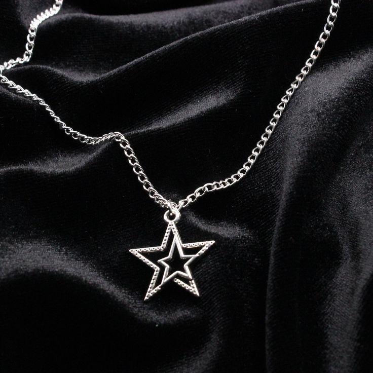 Handmade Tibetan Silver double Star pendant necklace with chain. This stunning Star necklace is something truly lovely you could wear every day. A lovely gift for someone special. Matching Star earrings available  Made with  ⭐ Tibetan silver double Star charm (measures 23x20mm) ⭐ 18 inch or 20 inch chain  Item will be sent on a decorative card and wrapped in tissue paper before posting Please do not wear this necklace while showering, sleeping or doing sports. Water and perfumes could cause the Trendy Star-shaped Metal Charm Necklaces, Star-shaped Metal Chain Necklace As Gift, Star Shaped Metal Chain Necklace As Gift, Star-shaped Metal Chain Necklace For Gift, Star-shaped Chain Necklace As Gift, Star-shaped Chain Necklace For Gift, Trendy Star Charm Chain Necklace Gift, Trendy Chain Necklace With Star Charm Gift, Silver Star-shaped Clavicle Chain Necklace