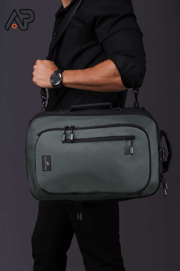 A functional AND sophisticated bag?! Yes please! The Meta duffle is just what you need! Not only can you wear this bag as a brief, but you can also wear it as a backpack or shoulder bag. The Meta can hold a 15-inch laptop or tablet, and features compression locks and versatile strap technology. The Meta bag is ready for action! Tap to shop! Working Professional, Business Bag, Duffle Bags, Luggage Tags, Laptop Sleeves, Duffle Bag, Tap, Wear It, Shoulder Strap