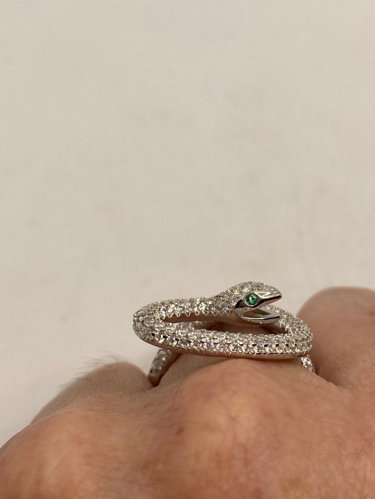 Luxury Snake Ring With 17 Jewels For Gift, Unique Hallmarked Snake Ring For Formal Occasions, Collectible Silver Diamond Ring, Luxury Sterling Silver Hallmarked Emerald Ring, Luxury Hallmarked Emerald Ring In Sterling Silver, Elegant Silver Snake Ring For Collectors, Unique Silver Diamond Emerald Ring, Vintage Silver Snake Ring For Anniversary, Vintage Sterling Silver Snake Ring As A Gift