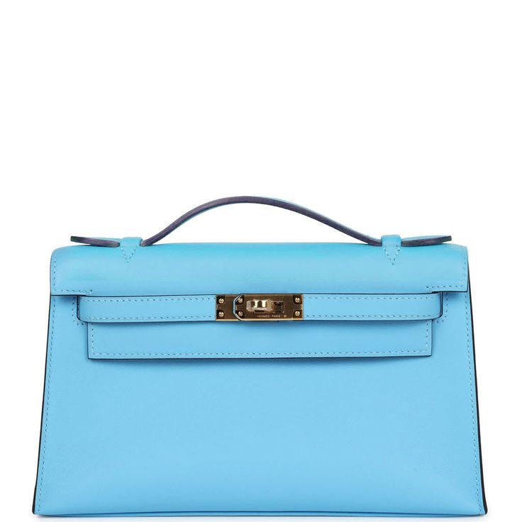 This Kelly Pochette is in Bleu Celeste swift leather with gold hardware and has tonal stitching, front flap, two straps with center toggle closure and a top flat handle.The interior is lined with Bleu Celeste lambskin and has an open wall pocket.Collection: BOrigin: FranceCondition: New and never worn (plastic on hardware) Accompanied by: Hermes box, Hermes dustbag, felt, carebook and ribbonMeasurements: 8.5" width x 5" height x 2.5" depth; 1" handle drop Elegant Blue Double Flap Bag, Classic Blue Bag With Cc Turnlock Closure, Formal Blue Bag With Double Flap, Formal Blue Bags With Double Flap, Formal Blue Double Flap Bag, Chic Blue Bag With Cc Turnlock Closure, Blue Leather Shoulder Bag With Cc Turnlock Closure, Luxury Blue Flap Bag For Travel, Blue Luxury Flap Bag For Formal Occasions