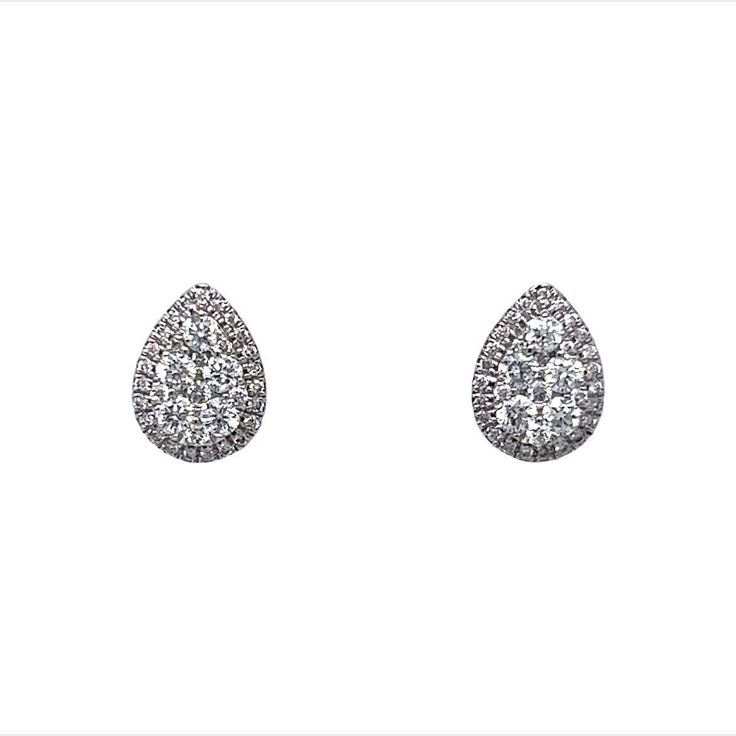 Petit Pear Shaped Earrings w/ Diamonds 14K White Gold These modern cluster earrings feature .48 carats of diamonds and are finished in 14 karat white gold. The clusters are pear shaped with smaller diamonds outlining the border and larger stones in the center. These would be great for everyday wear and fancy evening wear as well! Primary Stone: Genuine Natural Diamond Shape and Measurements: 1.15 mm = .006 ct(70) Color: G/H Clarity: VS2 / SI1 Stone Weight: .48 ct General Characteristics: Measure Dazzling Cluster Diamond Earrings For Formal Occasions, Dazzling Cluster Diamond Earrings For Formal Events, Platinum Cluster Diamond Earrings For Formal Occasions, Formal Pear-shaped Pave Earrings, Formal Pear-shaped Pave Setting Earrings, Formal Pear-shaped Earrings With Pave Setting, Formal Cluster Earrings With Brilliant Cut, Elegant Pear-shaped Diamond White Cluster Earrings, Formal Cluster Earrings With Diamond Accents