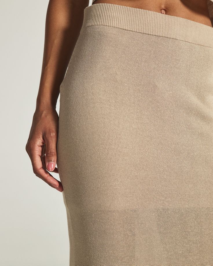 Meet Rumi, your new vacation-ready skirt. Carefully crafted with a delicate sheer linen blend knit fabrication, perfect to throw on after a quick dip in the pool. Wear with the matching Rumi Sheer Crop Tank to complete the look. Details Model is 5'9" and wears a size small. Care: Machine wash cold on delicate cycle. Do not bleach. Do not tumble dry, Iron on low. Do not dry clean. Dry flat. Composition: 73% Viscose | 15% Linen l 12% Polyester | 7DIAMONDS Women's Rumi Sheer Midi Skirt in Beige | S Elegant Seamless Summer Bottoms, Sheer Midi Skirt, Quick Dip, Gift Guide Women, Pool Wear, Briefcase Women, Cabin Bag, Travel Comfort, Lewis And Clark