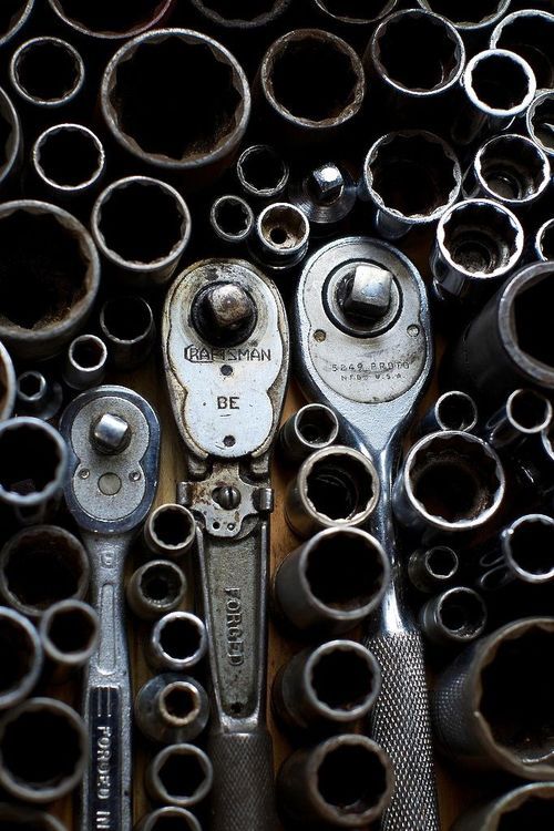 there are many wrenches and other tools in the bins that have holes on them