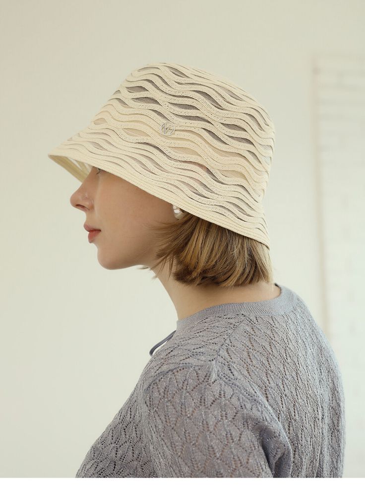 Editor's NotesMarchen is a contemporary hat brand with handcrafted hats inspired by classic designs, yet with a finishing touch of wit- Ronan mesh bucket hat- Natural shape and comfortable fit- Lightweight for daily wear- Wavy knitting for a feminine mood- Adequate size with inner strapMeasurements(in.)- One Size- Height 2.4in.- Brim 3.9in.- Circumference 22.0in. - 22.8in.Composition & Care- natural paper, cellulose- Do not bleach- Do not dry clean- Do not iron- Wash dark colors separatelyDe Chic Lightweight Bucket Hat, Summer Cloche Sun Hat, One Size Fits Most, Lightweight Beige Cloche Hat With Curved Brim, Spring Lightweight Cloche Hat With Short Brim, Chic Beige Bucket Hat, Lightweight Beige Cloche Hat With Short Brim, Casual Cloche Bucket Hat For Spring, Spring Casual Cloche Bucket Hat, Chic Beige Short Brim Bucket Hat