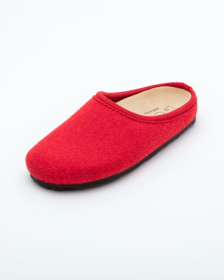 Description: The Nebraska Women's Wool Clog is an Italian take on a European classic. The women's Nebraska in red is one of the most versatile mule style slippers available. From home to the office to weekend, the minimalist design of these clogs will take you anywhere in comfort. The anatomical self-molding latex and thermoforming cork insole provide a firm customized comfort, and the insole is completely removable. LeClare Slippers are exclusively handcrafted in our small-batch factory in Trev Wool Clogs, Natural Contour, Wool Slippers, Comfort And Joy, The Minimalist, Outdoor Wear, Slide Slipper, Nebraska, Mule