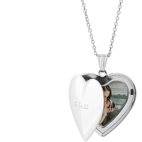 Made of stainless steel, with your choice of silver, gold or rose gold finish. Oval Locket measures 1.2 x 0.9, photo insert measures 0.9 x 0.6. Heart Locket measures 1.07 x 1.09, photo insert measures 0.8 x.85. Engraving available on front side only. Photos already sized and inserted inside. Comes with 18 coordinating chain and gift box. Imported. Personalized in USA Customizable Stainless Steel Heart Pendant Jewelry, Personalized Open Heart Locket Necklace For Weddings, Personalized Heart Medallion Necklace For Anniversary, Personalized Medallion Heart Necklace For Anniversary, White Stainless Steel Heart Pendant Jewelry, Keepsake Heart Necklace With Stainless Steel Heart Charm, Keepsake Heart Pendant Necklace In Stainless Steel, Double Heart Stainless Steel Jewelry For Personalized Gift, Stainless Steel Keepsake Necklaces For Valentine's Day