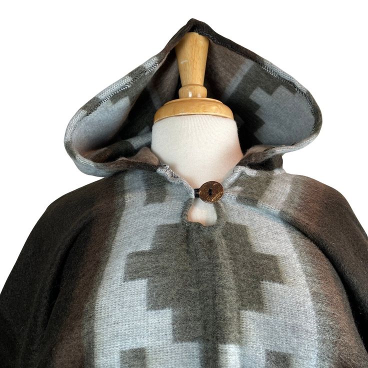 Discover the perfect blend of style and coziness with our women's and men's hooded alpaca poncho. Made from luxurious alpaca wool, this versatile garment is designed to keep you warm and fashionable. Shop now and elevate your winter wardrobe with our premium hooded alpaca poncho.- Very soft and warm- Large and long perfect for the coldest wintertime- Lightweight cape- Comfortable shawl- With fringes and geometric patterns - Made of alpaca wool and acrylicMeasurements: Length from shoulder to bot Cozy Brown Poncho For Outdoor, Cozy Brown Alpaca Poncho, Cozy Brown Hooded Poncho, Cozy Alpaca Poncho For Winter, Brown Alpaca Poncho For Winter, Brown Alpaca Winter Cape, Cozy Brown Wool Poncho, Cozy Alpaca Cape For Winter, Bohemian Alpaca Hooded Outerwear