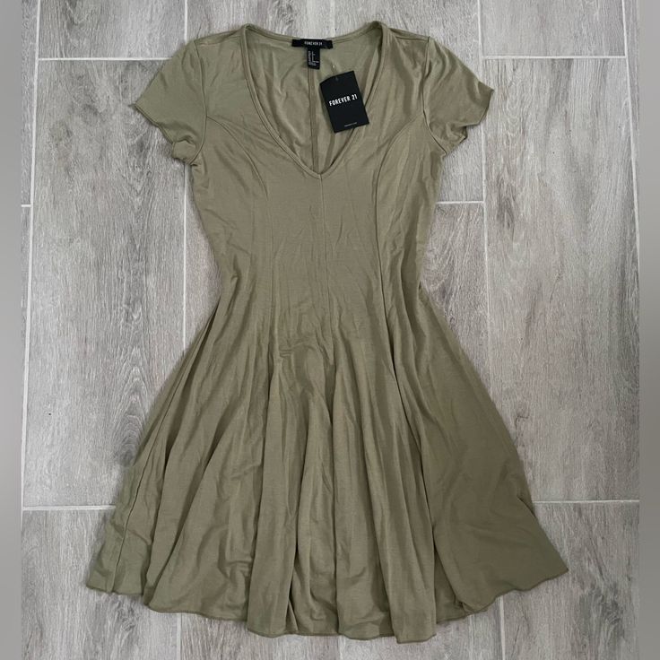 Olive Dress From F21. Brand New. Perfect For The Fall. Forever 21 Green Fitted Mini Dress, Forever 21 Fitted V-neck Midi Dress, Casual Green Forever 21 Dress, Forever 21 Casual Mini Dress, Forever 21 Casual V-neck Midi Dress, Casual Midi Dress From Forever 21, Forever 21 Casual Knee-length Mini Dress, Casual Fitted Midi Dress By Forever 21, Forever 21 Casual Fitted Midi Dress