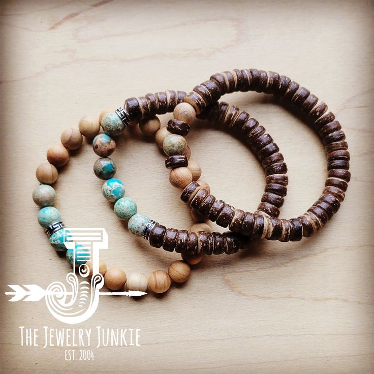 This set of three stretch bracelets combines Imperial Jasper beads and wood beads for a stunning combination of earthy tones and textures. Stylish and versatile, this trio of bracelets is the perfect accessory for modern boho looks and western-inspired ensembles. 8-10mm beaded stretch bracelet Made of Wood and Genuine Imperial Jasper Beads Stretch bracelet fits a variet of wrist sizes Although your item will resemble the photo, each piece is created by hand, so no two are identical.Thank you for Earthy Adjustable Bracelet With Wooden Beads, Earthy Wooden Beads Adjustable Bracelet, Earthy Adjustable Wooden Beads Bracelet, Bohemian Brown Stackable Bracelets, Adjustable Wooden Beads Bracelet Nature-inspired, Bohemian Brown Stretch Bracelet With 8mm Beads, Adjustable Rustic Beaded Bracelets For Everyday, Rustic Adjustable Beaded Bracelets For Everyday, Bohemian Brown Bracelets For Everyday