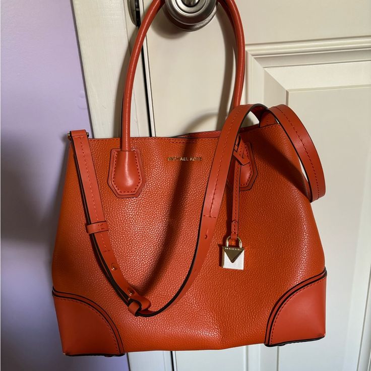 Brand New Condition. Gold Hardware. Comes With Matching, Detachable Shoulder Strap. Smoke Free Home. No Scratches, Marks Or Damage. Clean Inside And Out. Serious Inquiries Only, Will Provide Measurements If Requested. Michael Kors Bag With Removable Pouch For Errands, Michael Kors Bag With Removable Pouch For Everyday, Michael Kors Bag With Detachable Handle For Errands, Orange Bags With Leather Handles For Errands, Michael Kors Bags For Errands, Michael Kors Top Handle Satchel For Daily Use, Michael Kors Satchel With Detachable Handle For Daily Use, Everyday Michael Kors Bags With Detachable Handle, Everyday Michael Kors Bags