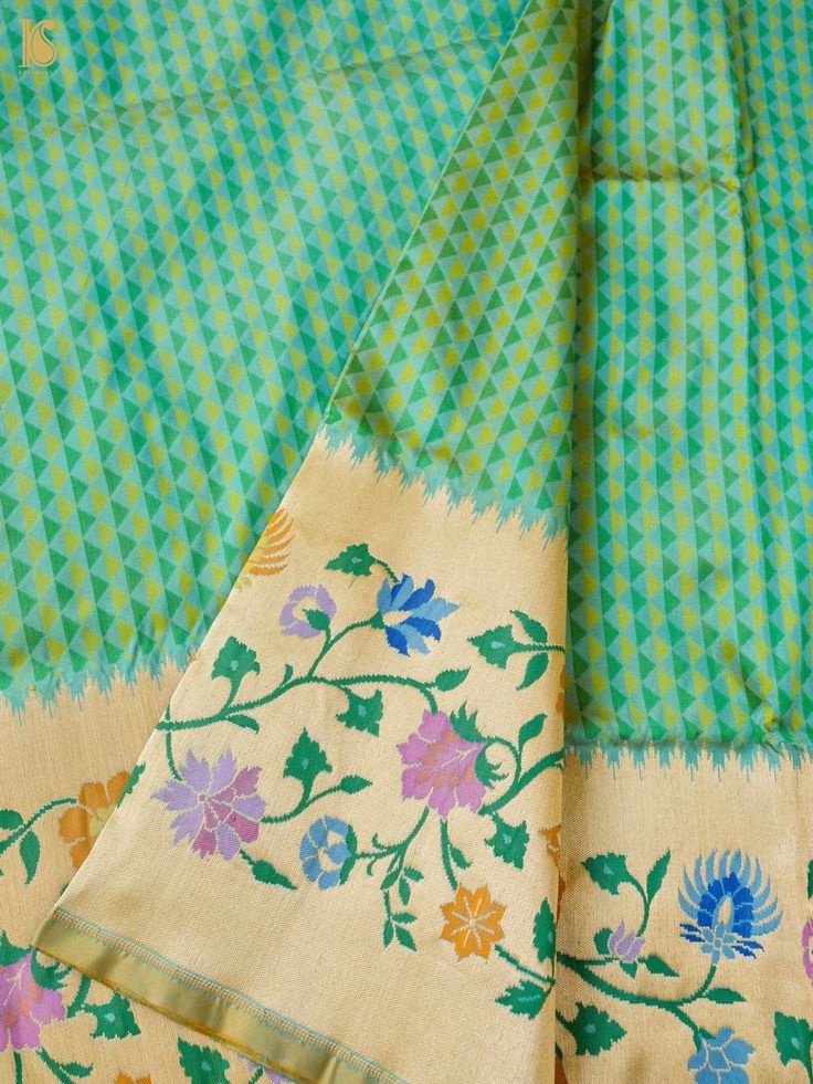 Experience the luxurious elegance of our Katan Silk Tanchoi Sarees, handcrafted with intricate Banarasi designs and premium Katan silk fabric. Available in a range of colors and styles, these sarees are the perfect choice for any special occasion Luxury Katan Silk Saree With Printed Motifs, Luxury Resham Embroidered Katan Silk Saree, Luxury Katan Silk Traditional Wear Handloom, Luxury Katan Silk Embroidered Fabric With Motifs, Luxury Katan Silk Fabric With Pallu Detail, Pre-draped Tussar Silk Saree With Meenakari For Festivals, Green Pre-draped Saree With Meenakari For Festivals, Green Meenakari Banarasi Silk Pre-draped Saree, Festive Green Pre-draped Saree With Meenakari