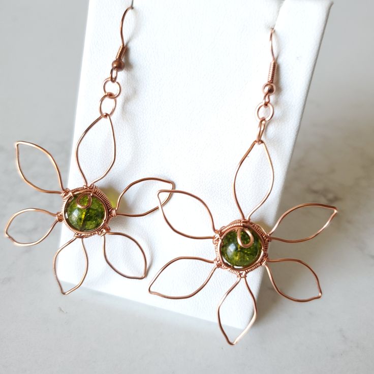 Copper Drop Earrings With Flower And Ear Wire, Copper Drop Flower Earrings With Ear Wire, Green Bohemian Earrings With Copper Wire, Green Copper Wire Earrings Gift, Adjustable Copper Flower Jewelry, Bohemian Green Earrings With Copper Wire, Green Bohemian Copper Wire Earrings, Handmade Copper Gold Flower Earrings, Handmade Copper Flower Earrings