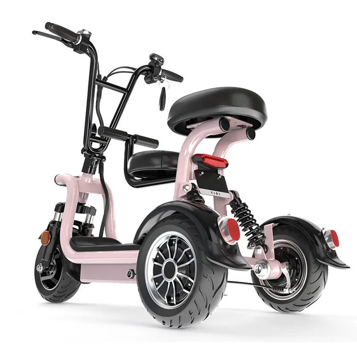 the pink scooter is on display against a white background with no one in it