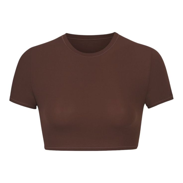 A Form-Fitting Crew Neck With Buttery Soft Feel, This Is A Flattering Crop T-Shirt Option To Wear Alone Or Styled With Other Pieces. High Neck Crewline, Super Cropped, Slim Fit, Short Sleeves Aslayy Is A Size 2 And 5’ 9”, Wearing A Skims S 76% Polyamide / 24% Elastane Machine Wash Cold, Non Chlorine Bleach, Cool Iron, Do Not Dry Clean Imported Solid Stretch Crop Top, Solid Color Stretch Crop Top, Fitted Cropped T-shirt For Athleisure, Fitted Solid Cropped T-shirt For Athleisure, Fitted Solid Color Cropped T-shirt Athleisure, Athleisure Snug Fit Crew Neck Top, Snug Fit Crew Neck Top In Athleisure Style, Snug Fit Crew Neck Top For Athleisure, Snug Fit Athleisure Top With Crew Neck