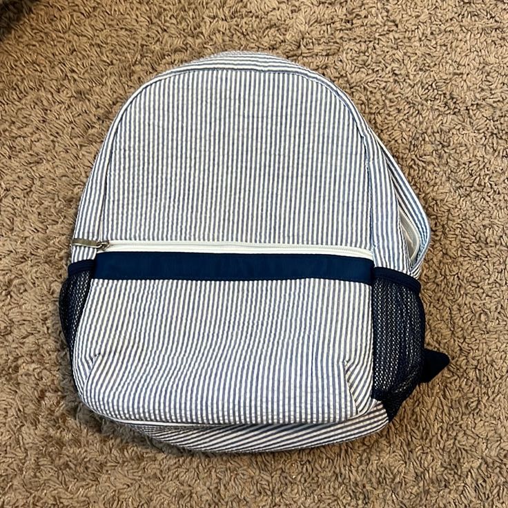 Navy Blue & White Striped Toddler Backpack. Front Zipper Pocket. Mesh Pockets On Each Side. Double Zippered Main Compartment With Big Pocket On Inside. Inside Material Is Easily Wiped Down. Barely Used, Like Brand New!! Preppy Blue Backpack For Back To School, Casual Backpack For End Of School Year, Casual Blue Bags, Blue Summer School Backpack, Back To School White Backpack, Amazon Accessories, Toddler Backpack, Big Pocket, Kids Accessories