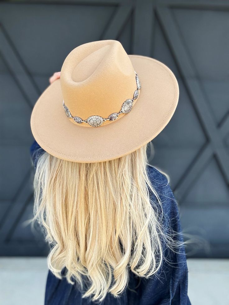 Get ready to turn heads with our Oval Conch Chain Hat. Available in Ivory, Brown, and Black. This uniquely designed hat features an oval-shaped brim adorned with a playful Concho chain. Add a pop of personality to your outfit with this fun and stylish western style hat. 100% Polyester, with an inner adjustable string. Trendy Hats For Kentucky Derby Festival, Trendy Curved Brim Fedora For Festival, Trendy Adjustable Hat Bands For Kentucky Derby, Trendy Adjustable Fedora With Flat Crown, Trendy Short Brim Felt Hat For Festivals, Trendy Fedora For Kentucky Derby, Trendy Felt Hat For Country Events, Trendy Flat Brim Fedora For Festival, Trendy Flat Crown Hat For Spring