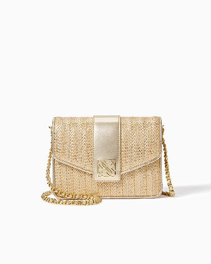 Textured herringbone crossbody bag with a gold metal chain strap and logo detail. Bag measures 8"W x 6"H x 2 1/4"D with a 22" crossbody drop.  Spot clean only. Imported. Complete your look with our gorgeously textured Dobson Crossbody Bag. Chic Rectangular Shoulder Bag With Gold-tone Logo, Chic Everyday Flap Bag With Gold-tone Logo Plaque, Chic Flap Bag With Gold-tone Logo Plaque, Chic Flap Bag With Gold-tone Logo, Chic Shoulder Bag With Gold-tone Logo Plaque, Gold Flap Bag With Gold-tone Logo For Everyday Use, Gold Flap Bag With Gold-tone Logo Plaque For Everyday, Everyday Gold Flap Bag With Gold-tone Logo Plaque, Chic Wallet On Chain With Gold-tone Logo For Everyday