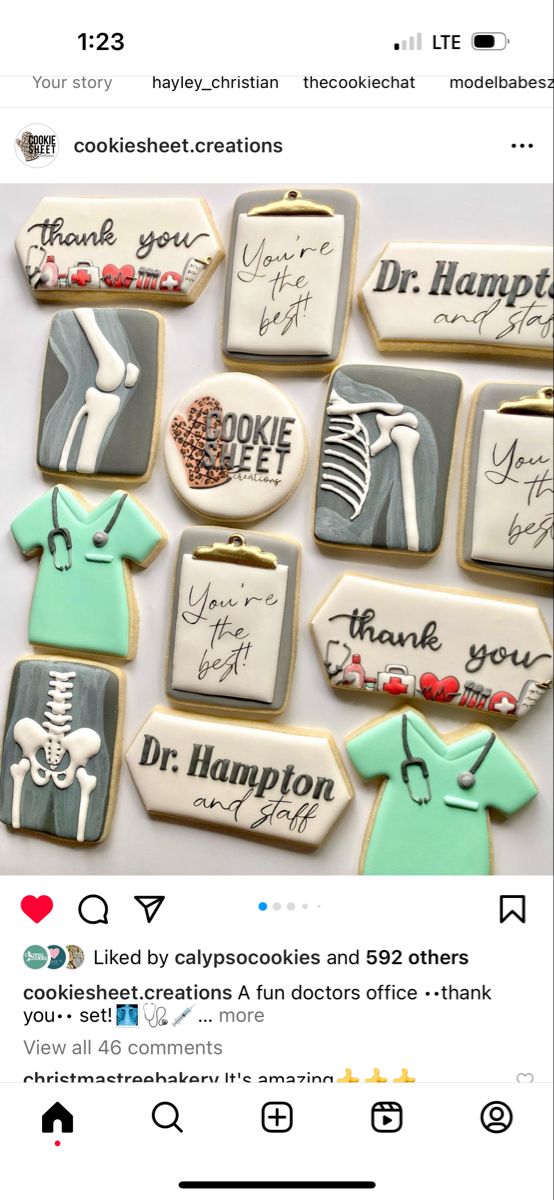 some cookies that have been decorated to look like doctors and nurse's shirts on them