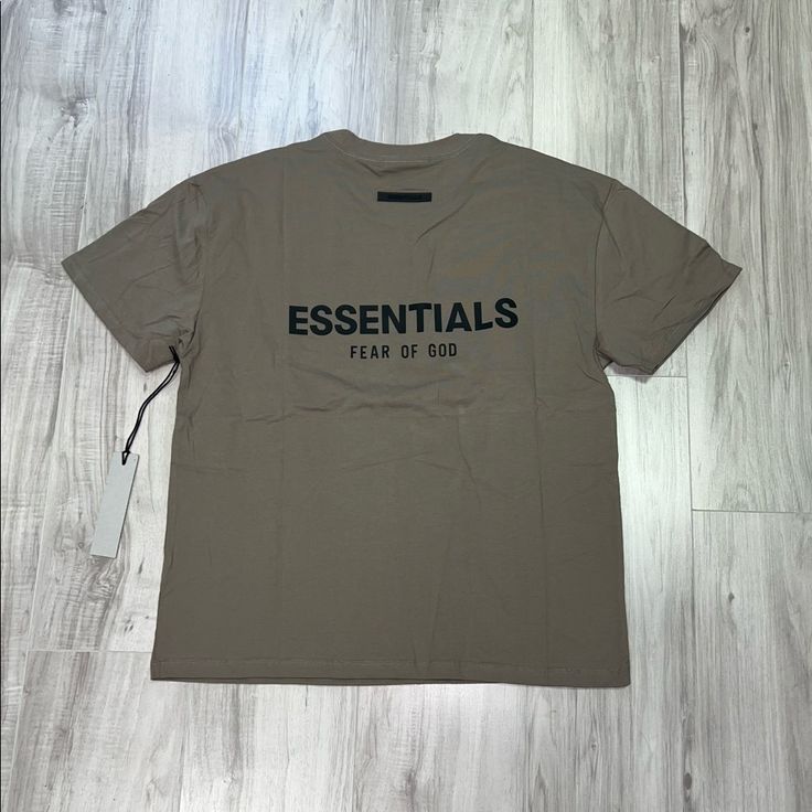 Instagram: @H0lykickz -Size Xs (Runs Big) -New Description Instagram, God Shirts, Tan T Shirt, Nba T Shirts, Hype Clothing, Fear Of God Essentials, Fear Of God, Off Black, Black Tshirt