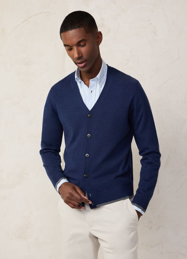 - Cardigan in 100% cashmere fabric. - V-neck. - Button fastening on the front. - Ribbed detail with trimming on neck, cuffs, and hem. - FAÇONNABLE logo label on side seam. - Oversized buttons with engraved logo. V-neck Cardigan With Button Cuffs For Work, Classic V-neck Fine Knit Cardigan, Wool V-neck Cardigan For Layering, Cashmere V-neck Outerwear With Buttons, Wool V-neck Sweater With Buttons, Elegant Merino Wool V-neck Outerwear, Merino Wool V-neck Sweater With Ribbed Cuffs For Work, Classic V-neck Cardigan With Button Cuffs, Classic Button-up Cashmere Sweater