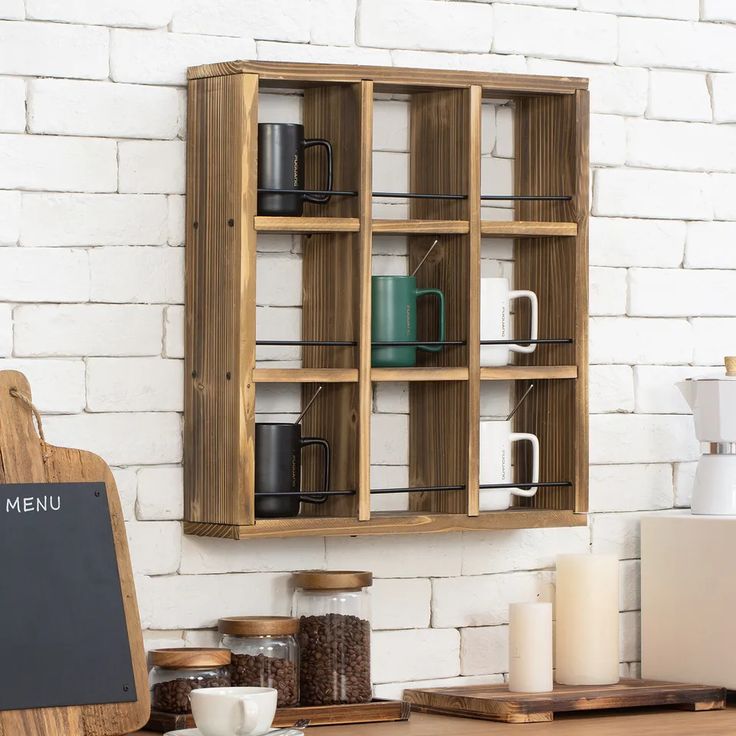 a wooden shelf with coffee mugs on it