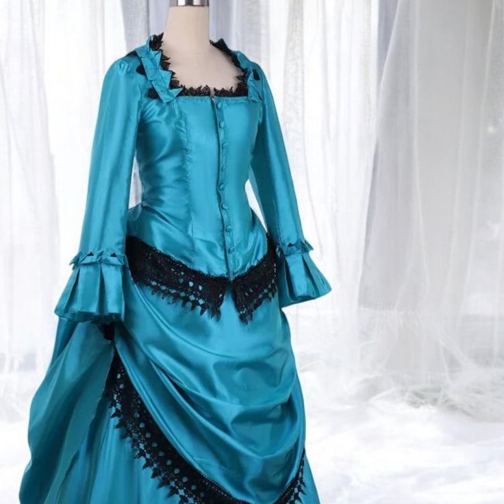 Victorian Dress, Victorian Gown, Ideal Victorian Costume for Reenactment, Cosplay, Victorian Ball Gown or Historical Themed Events & Parties Here is the optimized description using all the keywords for SEO and aligned with Etsy policies: **Features - Experience the elegance and grandeur of the Victorian Era Dress with intricate lace patterns that showcase the Victorian Fashion spirit. - The design enhances your beauty with the flowing charm of a classic Bustle Dress or Walking Dress. - Detailed Blue Victorian Dress For Costume Events, Vintage Fitted Gown For Halloween, Vintage Fitted Halloween Gown, Blue Regency Style Victorian Costume Dress, Blue Victorian Dress For Fancy Dress Events, Victorian Blue Dress For Fancy Dress Events, Victorian Blue Dress For Fancy Dress Occasions, Victorian Blue Dress For Fancy Occasions, Halloween Long Sleeve Vintage Costume Dress