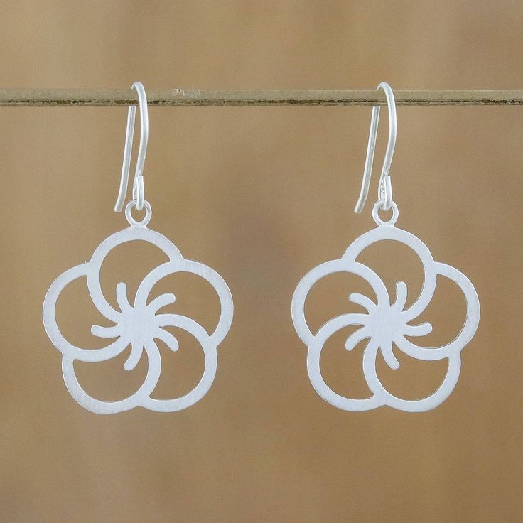 Caught in sterling silver cherry blossoms radiate infinite elegance. Thailand's Jantana designs the earrings which are crafted by hand featuring a brushed finish. .925 Sterling silver Nickel-free Sterling Silver Flower-shaped Earrings, Delicate Sterling Silver Flower Earrings, Delicate Sterling Silver Round Flower Earrings, Sterling Silver White Gold Flower Earrings Nickel-free, Silver Sterling Flower Earrings Hypoallergenic, Adjustable Sterling Silver Flower-shaped Earrings, Adjustable Sterling Silver Flower Earrings, Hypoallergenic White Gold Flower Earrings In Sterling Silver, Silver Earrings With Flower Charm