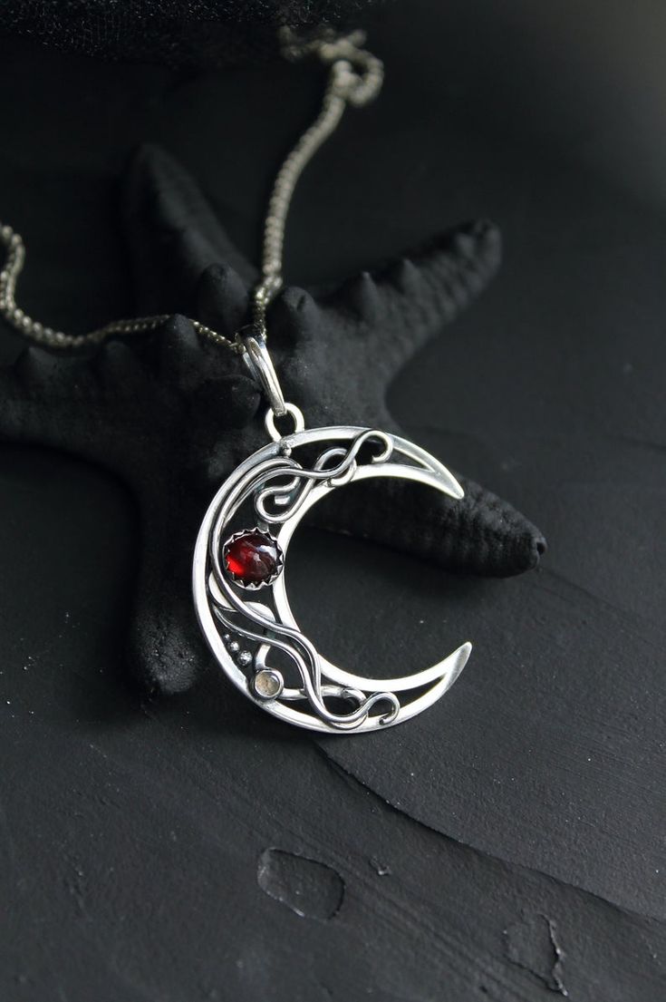 Moon necklace Garnet silver pendant Red moon pendant Wire | Etsy Spiritual Moon Phase Pendant Jewelry, Mystical Round Engraved Jewelry, Celestial Moon Charm Pendant Jewelry, Celestial Sterling Silver Moon Jewelry, Celestial Moon Shaped Sterling Silver Jewelry, Celestial Style Moon Charm Pendant Jewelry, Celestial Moon-shaped Sterling Silver Jewelry, Celestial Sterling Silver Round Pendant Jewelry, Celestial Moon Gemstone Jewelry