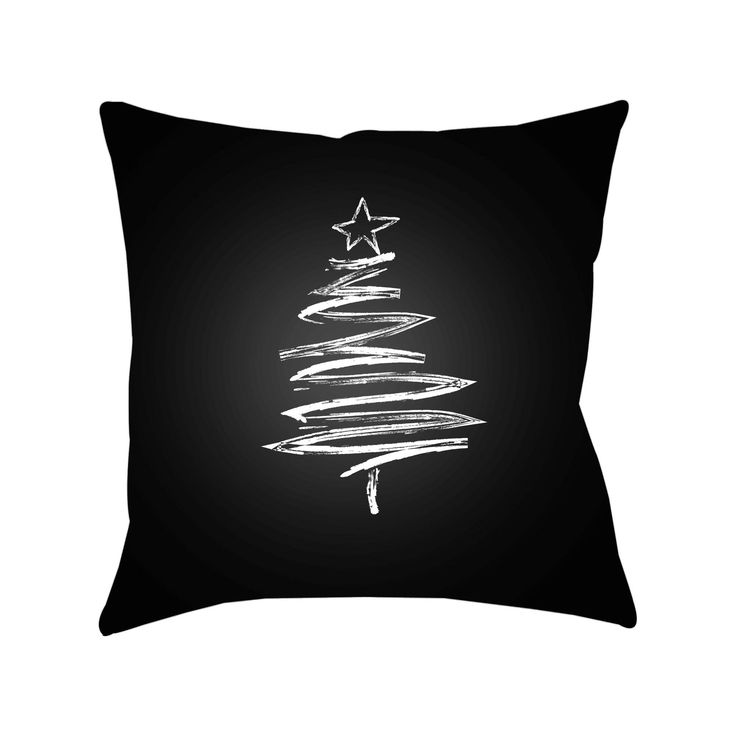 a black pillow with a christmas tree drawn on it