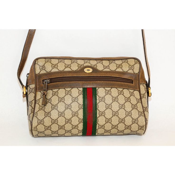 Vintage Gucci Monogram Shoulder Crossbody Bag Brown Canvas. Authentic, pre-loved vintage Gucci web GG Supreme coated canvas shoulder bag. This chic and rare Gucci web bag is a must-have for Gucci lovers.  Authentic vintage marked as Gucci Accessory collection with serial number. Classic Vintage Gucci purse. This is a classic crossbody bag with signature red and green canvas striping.  Vintage Brown & Beige GG Supreme Ophidia Bag Coated canvas shoulder bag in beige featuring logo pattern in brown Retro Gucci Rectangular Shoulder Bag, Retro Gucci Shoulder Bag, Pre-owned Rectangular Gucci Shoulder Bag, Pre-owned Gucci Shoulder Bag For Travel, Vintage Gucci Rectangular Bag, Pre-owned Monogram Canvas Rectangular Shoulder Bag, Vintage Gucci Shoulder Bag For Travel, Pre-owned Rectangular Monogram Canvas Shoulder Bag, Vintage Monogram Canvas Rectangular Shoulder Bag