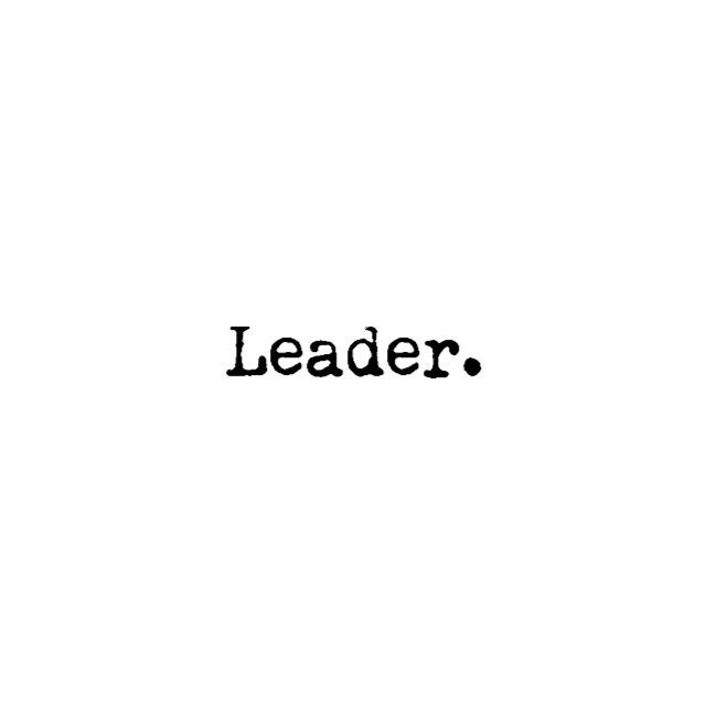 the word leader written in black ink on a white background