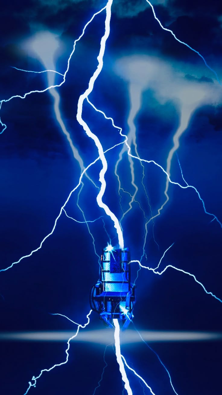 a large tower sitting under a lightning filled sky