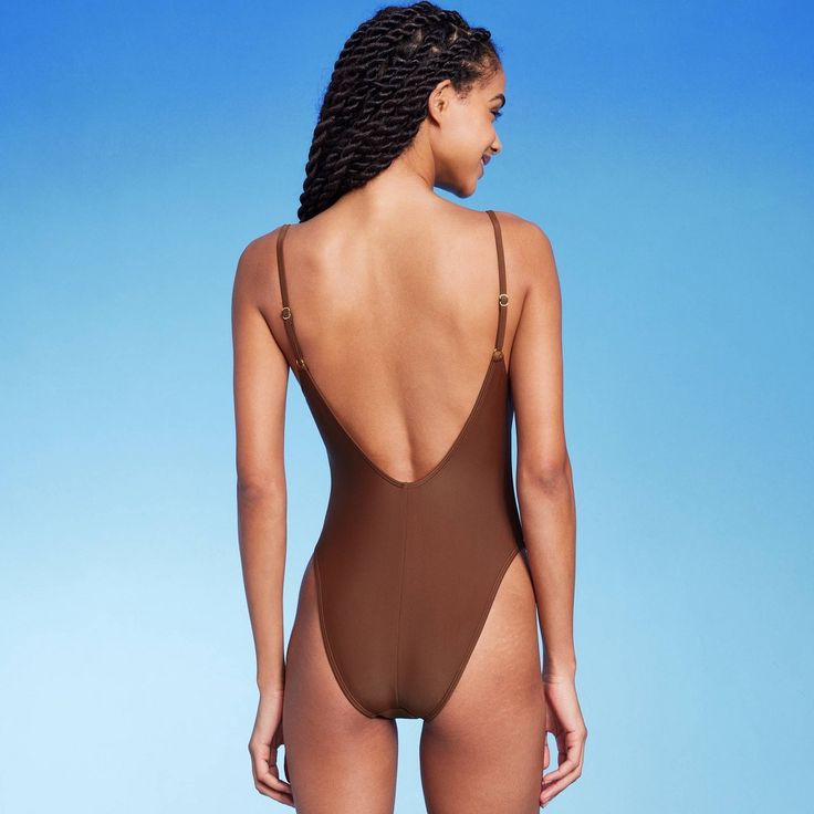 Cheeky scoop-back one-piece swimsuit from Wild Fable™ with a flattering ultra-high-leg design. Soft and stretchy opaque fabric with a built-in shelf bra. Adjustable shoulder straps provide the perfect stay-put fit. Sizes XS-XL have no cups, sizes 14-26 have removable cups. If you're not satisfied with any Target Owned Brand item, return it within one year with a receipt for an exchange or a refund. Wild Fable™: A look for every story. Backless Smoothing Bodysuit For Beach, Scoop Back Bodysuit With Solid Back For Poolside, Nylon Bodysuit With Solid Back For Poolside, Beach Bodysuit With Scoop Back And Moderate Coverage, Beach Swimwear With Solid Back And Second-skin Fit, Beach Bodysuit With Smoothing Second-skin Fit, Low Back Nylon Bodysuit For Pool, Swimming Bodysuit With Scoop Back, Second-skin Beachwear Swimwear With Solid Back