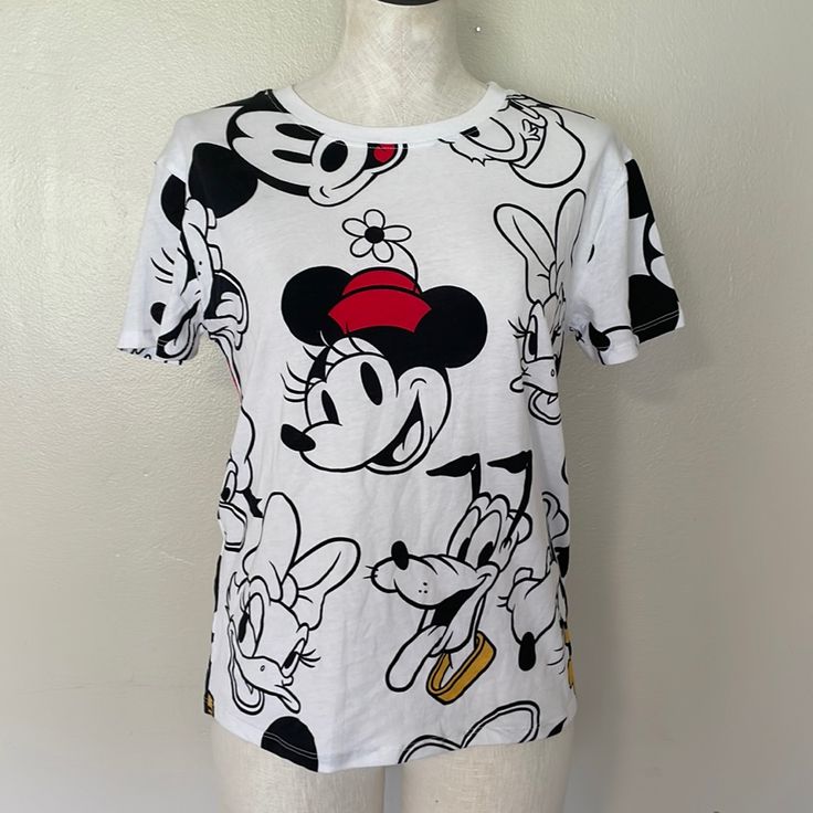 New Without Tags. No Stains Or Flaws. Never Worn Disney Size Small 19 Inches Pit To Pit 24 Inches In Length Cute Black And White Tee With Pops Of Red And Yellow Minnie Mouse Pluto Daisy Duck Mickey Mouse So Cute!! White Cotton Disney Shirt, Casual Mickey Mouse T-shirt For Spring, Casual T-shirt For Disney Fan Events In Summer, Fun White Top With Cartoon Print, Fun White Tops With Cartoon Print, White Fun Tops With Cartoon Print, White Top With Cartoon Print, Spring Mickey Mouse Crew Neck T-shirt, Disney Style White T-shirt With Funny Print