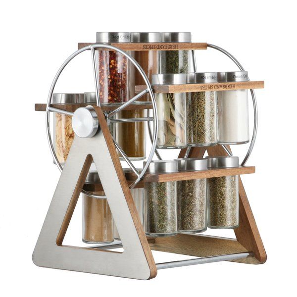 a spice rack with spices and seasonings in it