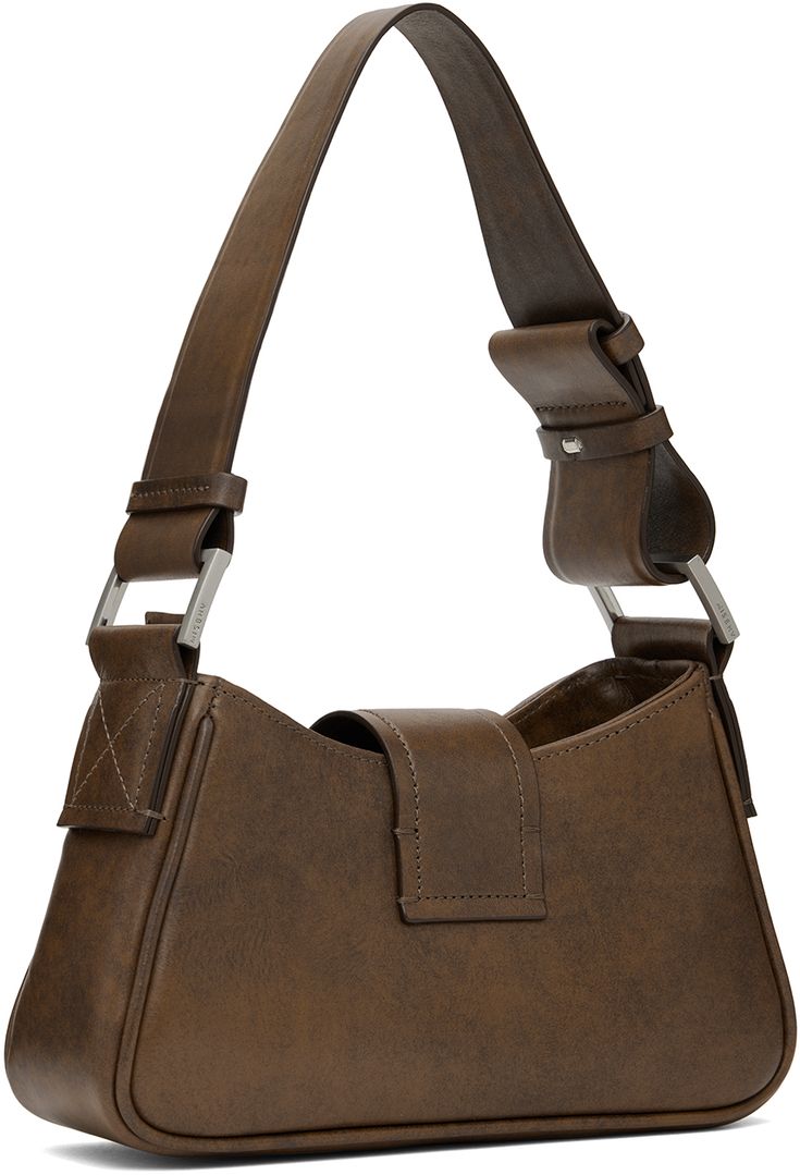 Buffed leather shoulder bag in brown. · Fading and subtle distressing throughout · Adjustable shoulder strap · Logo hardware at face · Magnetic foldover flap · Zip closure · Logo-woven twill lining · Logo-engraved silver-tone hardware · H5 x W9.25 x D2.75 Supplier color: Brown faded Vintage Satchel Shoulder Bag With Gunmetal Hardware, Vintage Leather Shoulder Bag With Gunmetal Hardware, Vintage Shoulder Bag With Gunmetal Hardware For Daily Use, Vintage Leather Baguette Bag For Everyday Use, Luxury Brown Shoulder Bag With Gunmetal Hardware, Brown Textured Leather Baguette Bag, Brown Rectangular Shoulder Bag With Gunmetal Hardware, Brown Rectangular Hobo Bag With Silver-tone Hardware, Brown Rectangular Satchel With Gunmetal Hardware