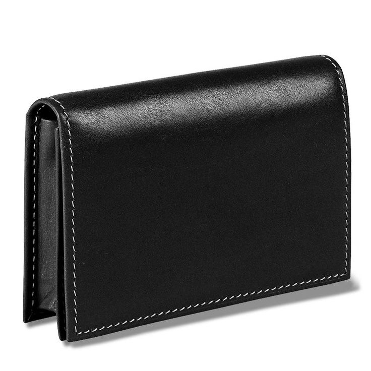 An elegantly streamlined leather business card holder. Our full-grain leather card wallet can hold up to 40 business cards. (You can alternately carry up to 20 plastic cards, plus your ID.) A Levenger Heritage Product—true classics never go out of style. Add a monogram for a personal touch. Formal Bifold Card Holder With Rfid Blocking, Modern Wallet With Id Window For Business, Modern Trifold Wallet With Interior Card Slots For Business, Modern Leather Card Holder For Business, Classic Black Bifold Card Holder, Modern Leather Business Card Holder, Modern Business Wallet With Id Window, Classic Black Trifold Wallet With Card Slots, Classic Black Trifold Card Holder