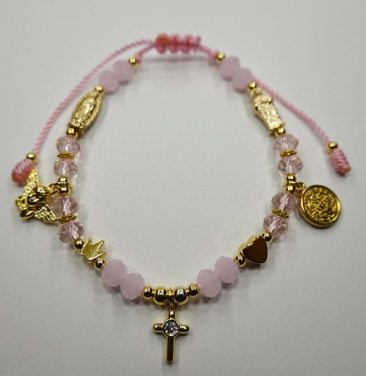 -It is recommended to take off your bracelet while sleeping and showering, not only does it increase the chances of your bracelet becoming tarnished or damaged, it is also considered unlucky. Exchange and returns: Returns CANNOT be accepted. If there is any issue, Please feel free to contact me so we can get it resolved. Shipping & Adjustable Pink Rosary Bracelet For Friendship, Pink Adjustable Rosary Bracelet For Friendship, Nickel-free Spiritual Charm Bracelet As A Gift, Spiritual Nickel-free Charm Bracelet For Gifts, Spiritual Nickel-free Charm Bracelet As Gift, Adjustable Gold Rosary Bracelet For Gift, Adjustable Gold Rosary Bracelet As Gift, Pink Hypoallergenic Charm Bracelet Gift, Adjustable Jubilee Charm Bracelet For Friendship