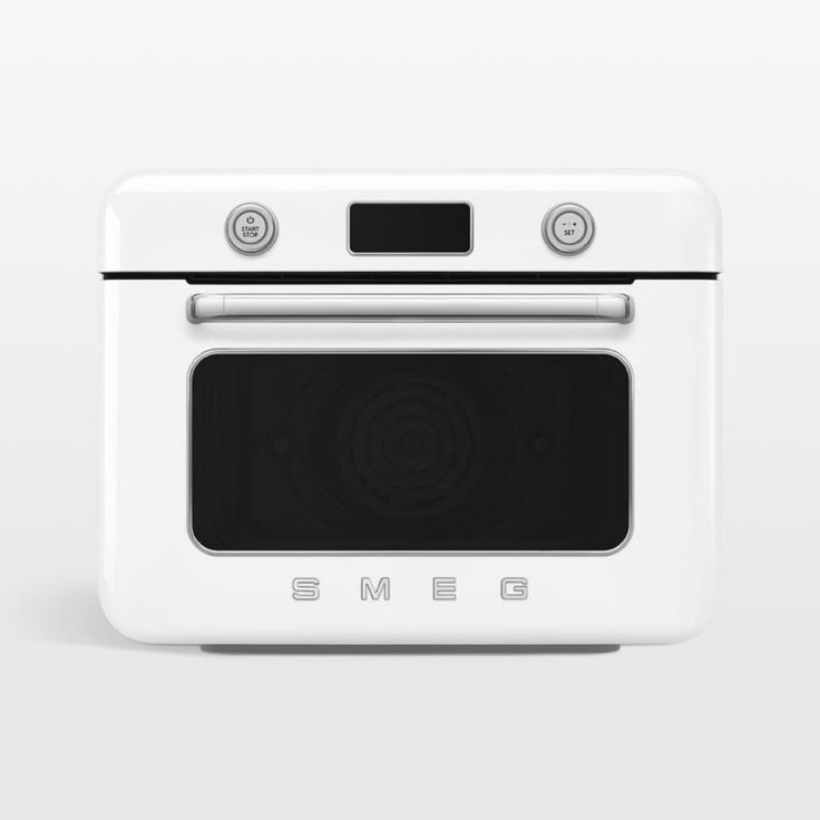 a white oven with the door open on a gray background, it appears to be empty