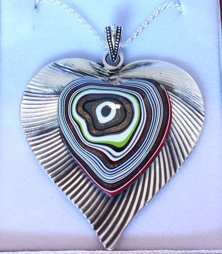 "Fordite Detroit Agate Heart necklace on Silver Heart Italian Silver Chain  Pendant is 2.25\" long including the bail  Comes in a leatherette gift box" Multicolor Heart Pendant Jewelry For Gift, Multicolor Double Heart Jewelry Gift, Multicolor Double Heart Jewelry For Gift, Elegant Multicolor Heart Necklace Gift, Elegant Multicolor Heart Necklace For Gift, Brown Heart Shaped Jewelry With Heart Beads, Brown Heart Charm Jewelry Gift, Clay Arts, Silver Chain Pendant